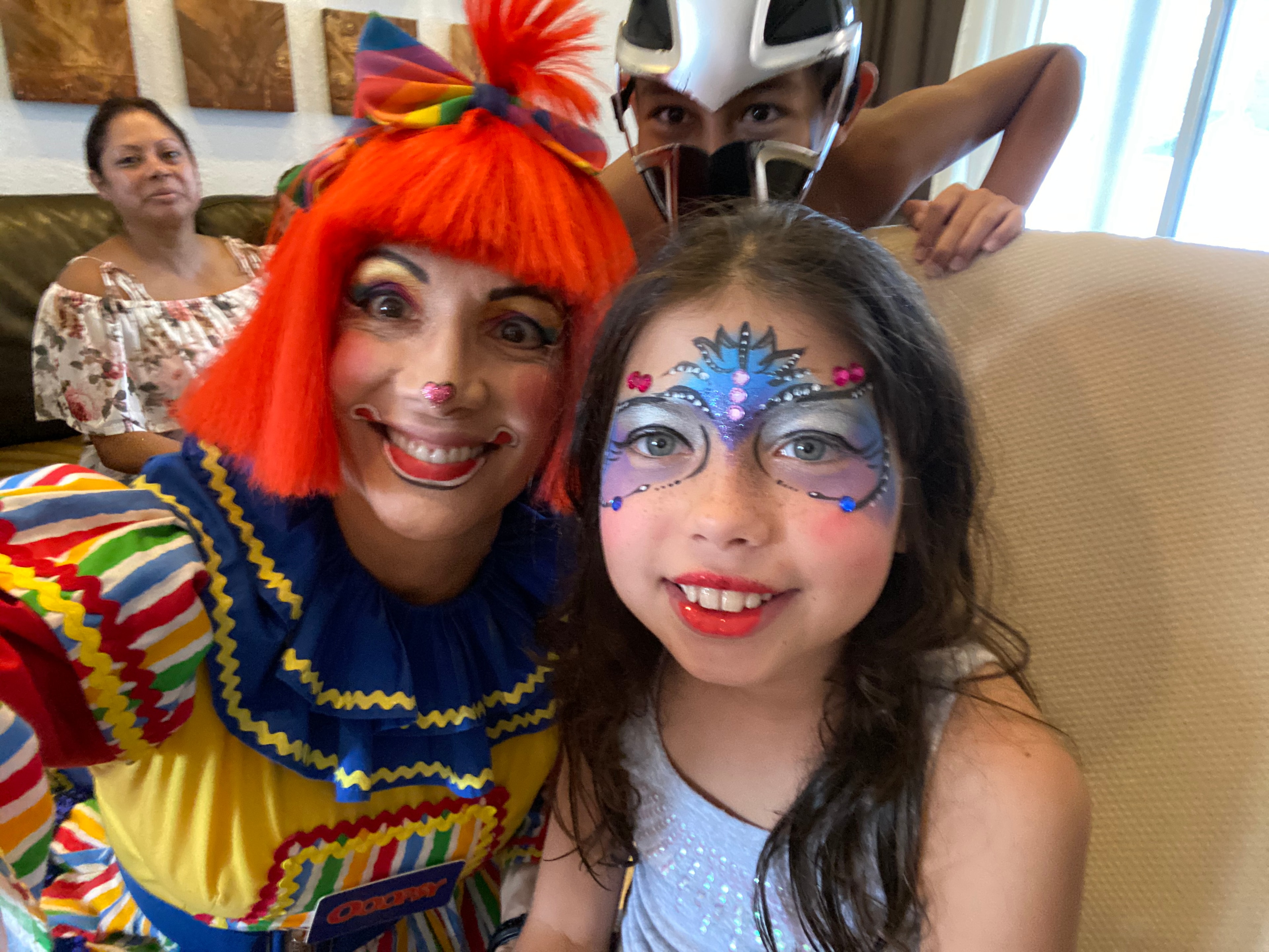Butterfly with gems face painting by OOOPSY Face Painting Team