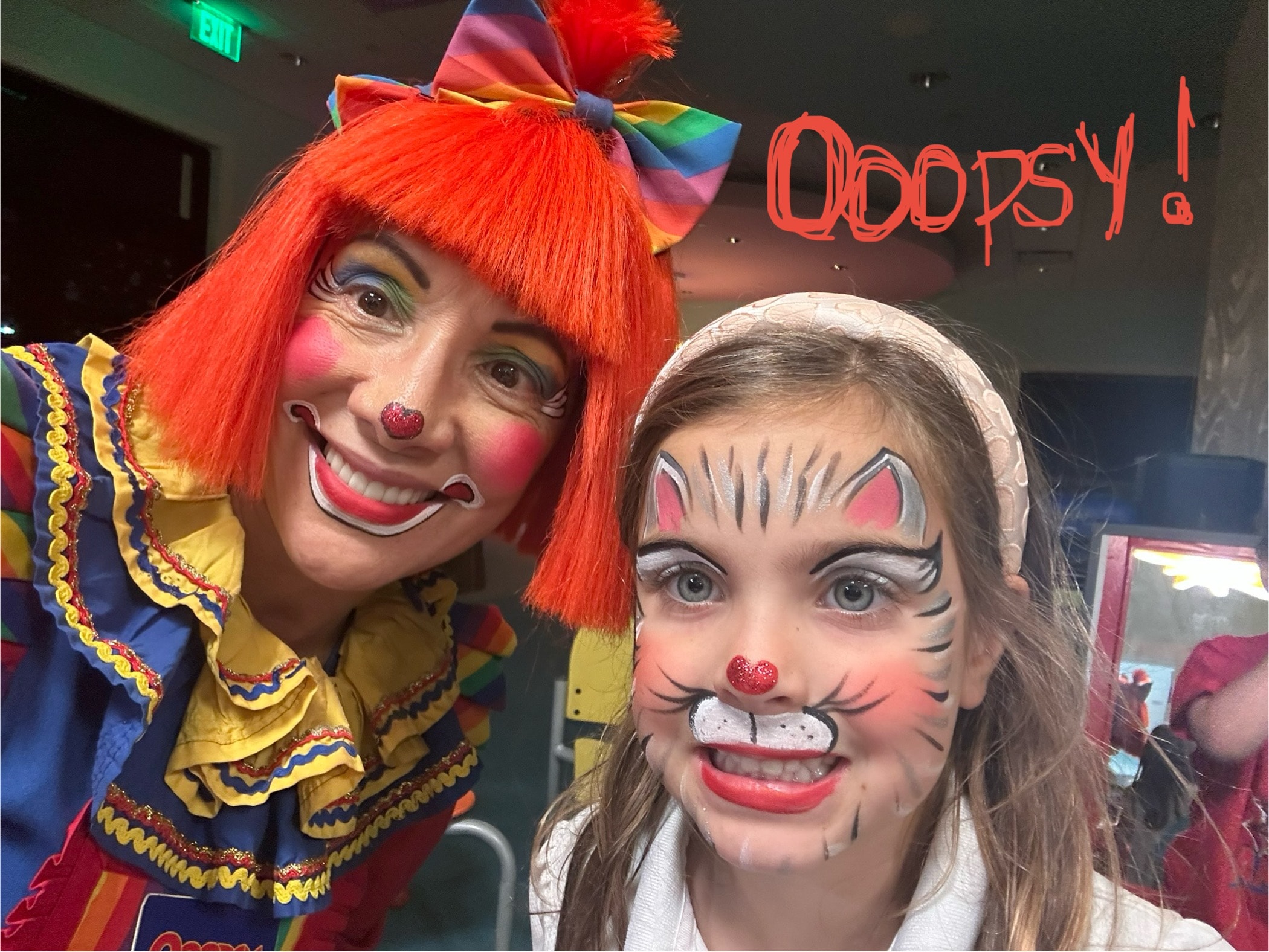 Cat face painting by OOOPSY Face Painting Team