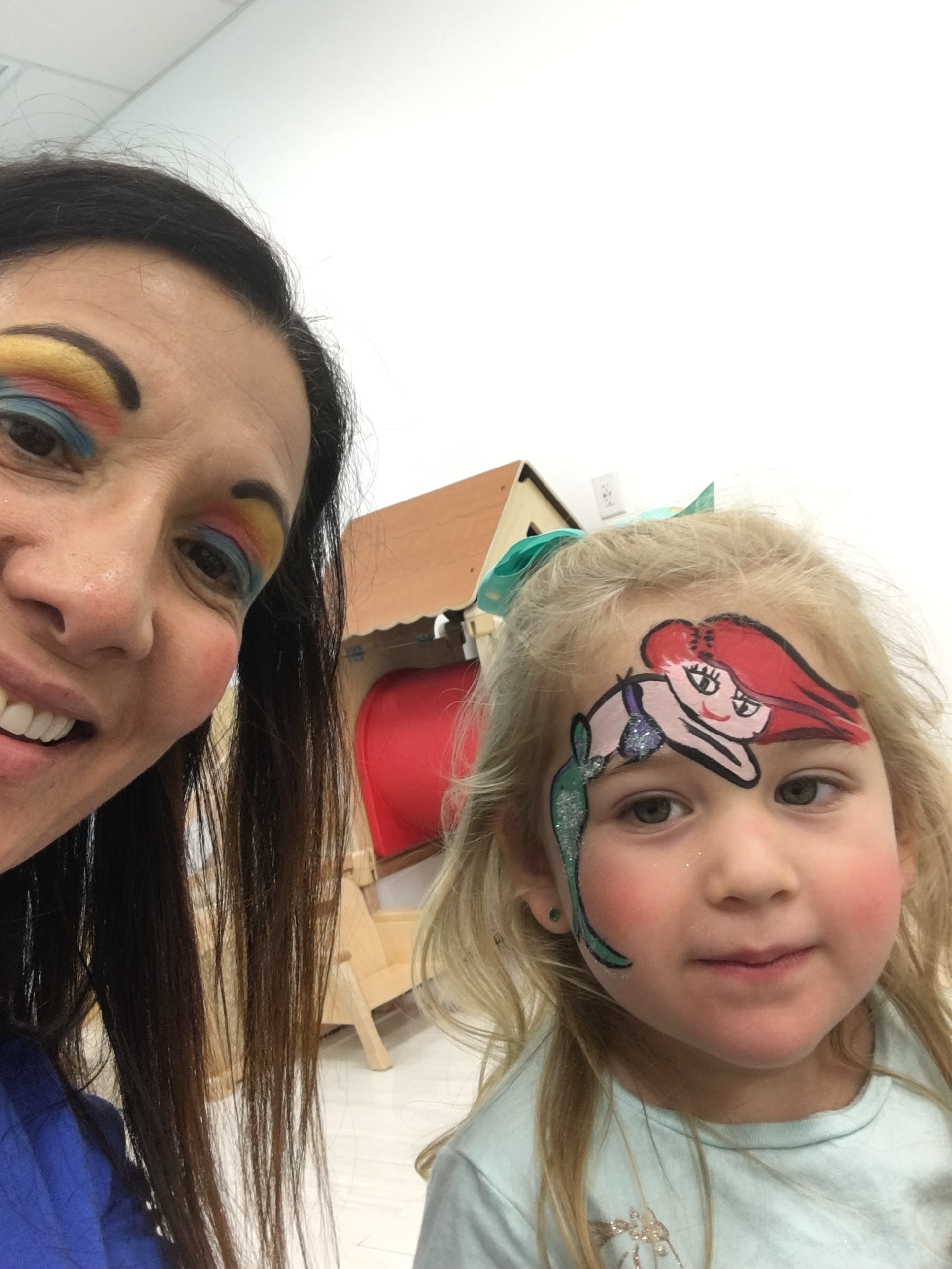 Mermaid Ariel face painting by OOOPSY Face Painting Team