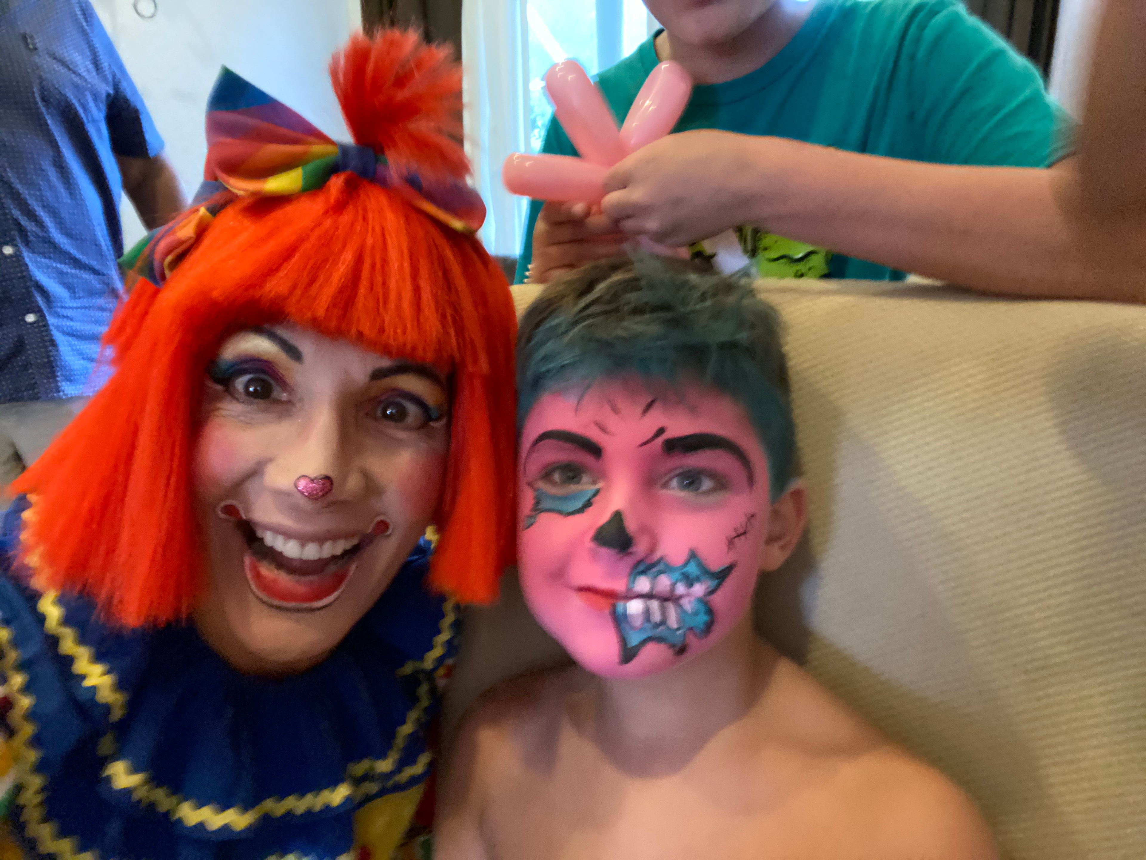 Pink zombie face painting by OOOPSY Face Painting Team