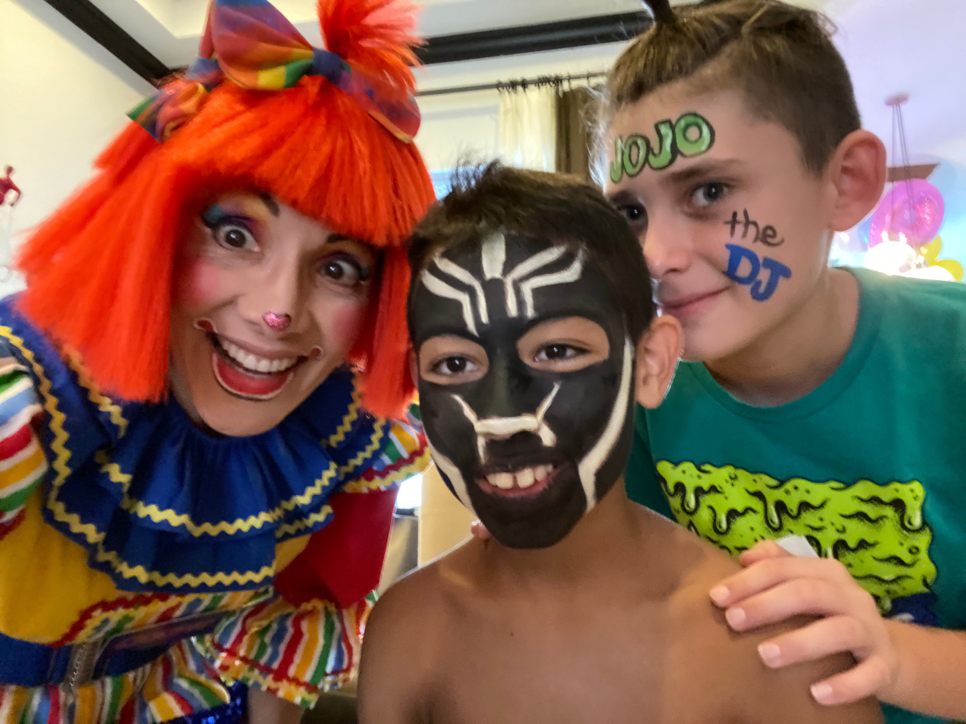 Spiderman group face painting by OOOPSY Face Painting Team