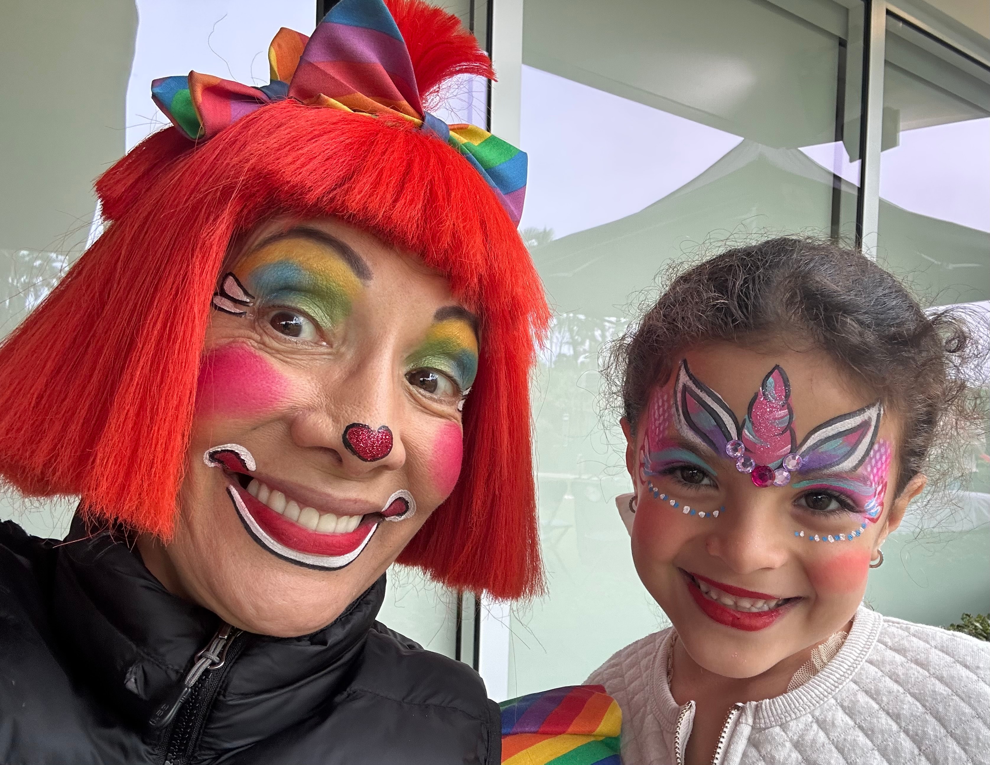 Unicorn with gems face painting by OOOPSY Face Painting Team