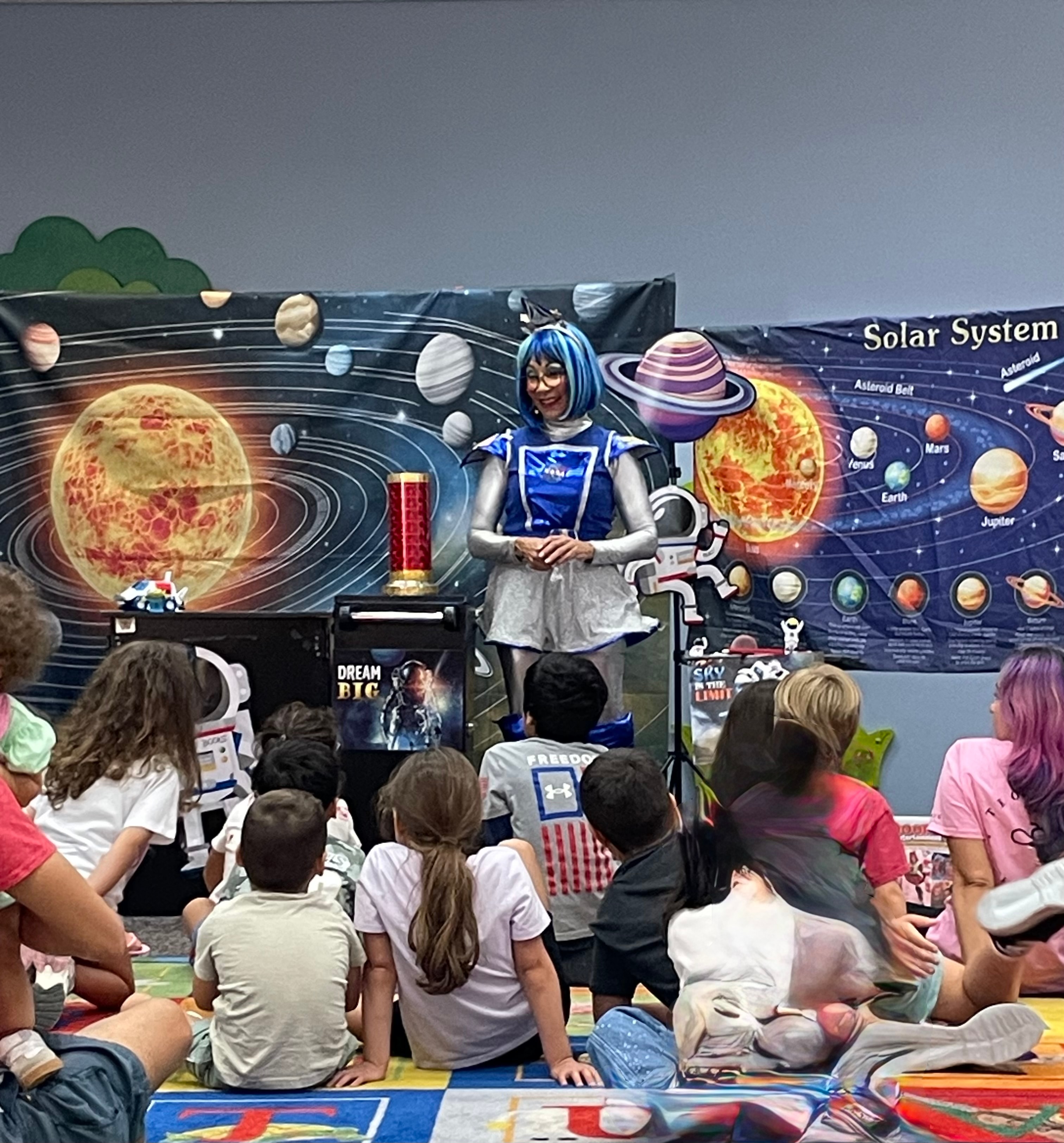 OOOPSY Galaxy Space Show performer at library